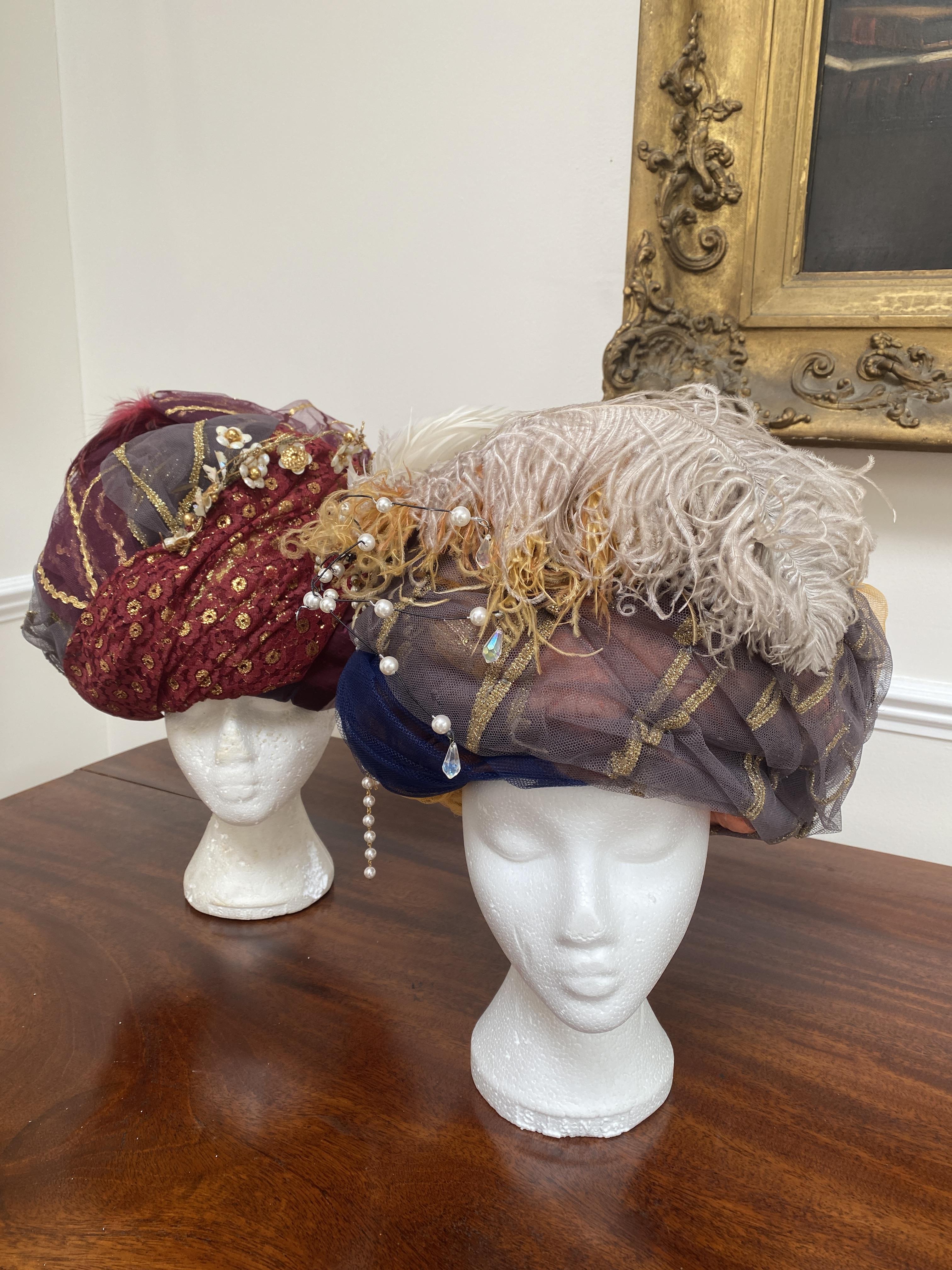 Two elaborate turbans, labelled Royal Opera House ‘Lucrezia Borgia', and two modern Indian turban hats